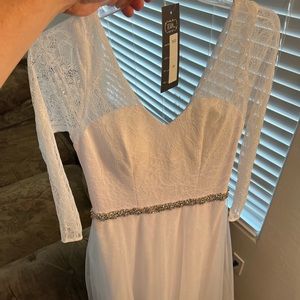 New never worn Eva wedding dress medium